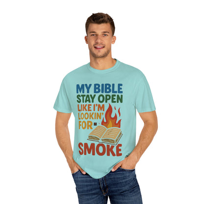 MY BIBLE STAYS OPEN LIKE IM LOOKING FOR SMOKE